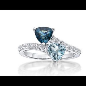 Genuine Blue Topaz and Lab Sapphire Ring. Size 7